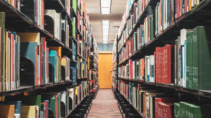 Slide: image of library stacks